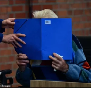 Death camp guard, 100, becomes the oldest person ever tried for Nazi-era crimes as he arrives at court in Germany