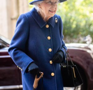 Queen Elizabeth, 95, uses walking stick for for the first time in 18 years as she attends thanksgiving service (Photos)