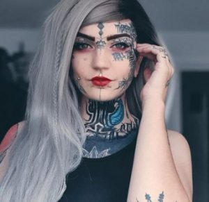 Mum-of-two knocks security guards who follow her about in shops and parents who cross the roads to avoid her because of her extreme tattoos (photos)